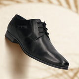 Men's Bugatti derby black leather shoes with a pointed toe and plain toe featuring a moulded heel , a pvc outsole , and laces fastening.