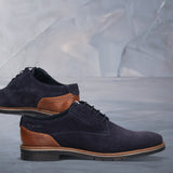 Men's Bugatti derby blue leather shoes with a round toe and plain toe featuring a stacked heel , a tpr outsole , and laces fastening.