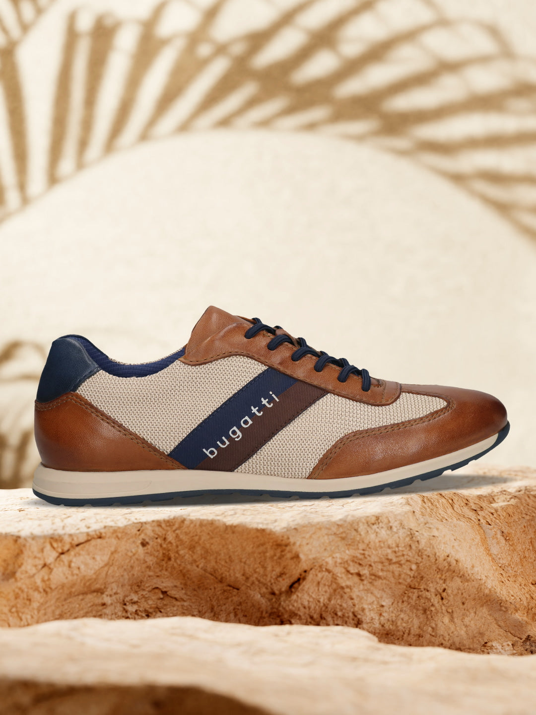 Men's Bugatti leather cognac leather shoes with a round toe , a tpr outsole , and laces fastening.