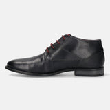 A blue Men's bugatti Chukka Boots featuring a round toe plain toe, stacked heel, and a wide fit. Made from premium genuine leather with a durable tpr outsole, this laces design offers both style and comfort.