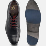 A blue Men's bugatti Chukka Boots featuring a round toe plain toe, stacked heel, and a wide fit. Made from premium genuine leather with a durable tpr outsole, this laces design offers both style and comfort.
