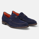 A blue Men's bugatti Penny Loafer featuring a round apron toe, moulded heel. Made from suede leather with a durable tr outsole, this slip-on design offers both style and comfort.