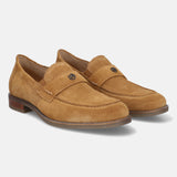 A beige Men's bugatti Penny Loafer featuring a round apron toe, moulded heel. Made from suede leather with a durable tr outsole, this slip-on design offers both style and comfort.