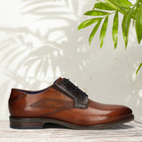 Men's Bugatti derby cognac leather shoes with a pointed toe and plain toe featuring a moulded heel , a tpr outsole , and laces fastening.