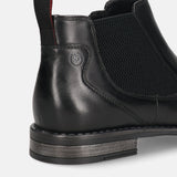 A black Men's bugatti Chelsea Boots featuring a round toe plain toe, moulded heel, and a wide fit. Made from premium genuine leather with a durable tr outsole, this zipper design offers both style and comfort.