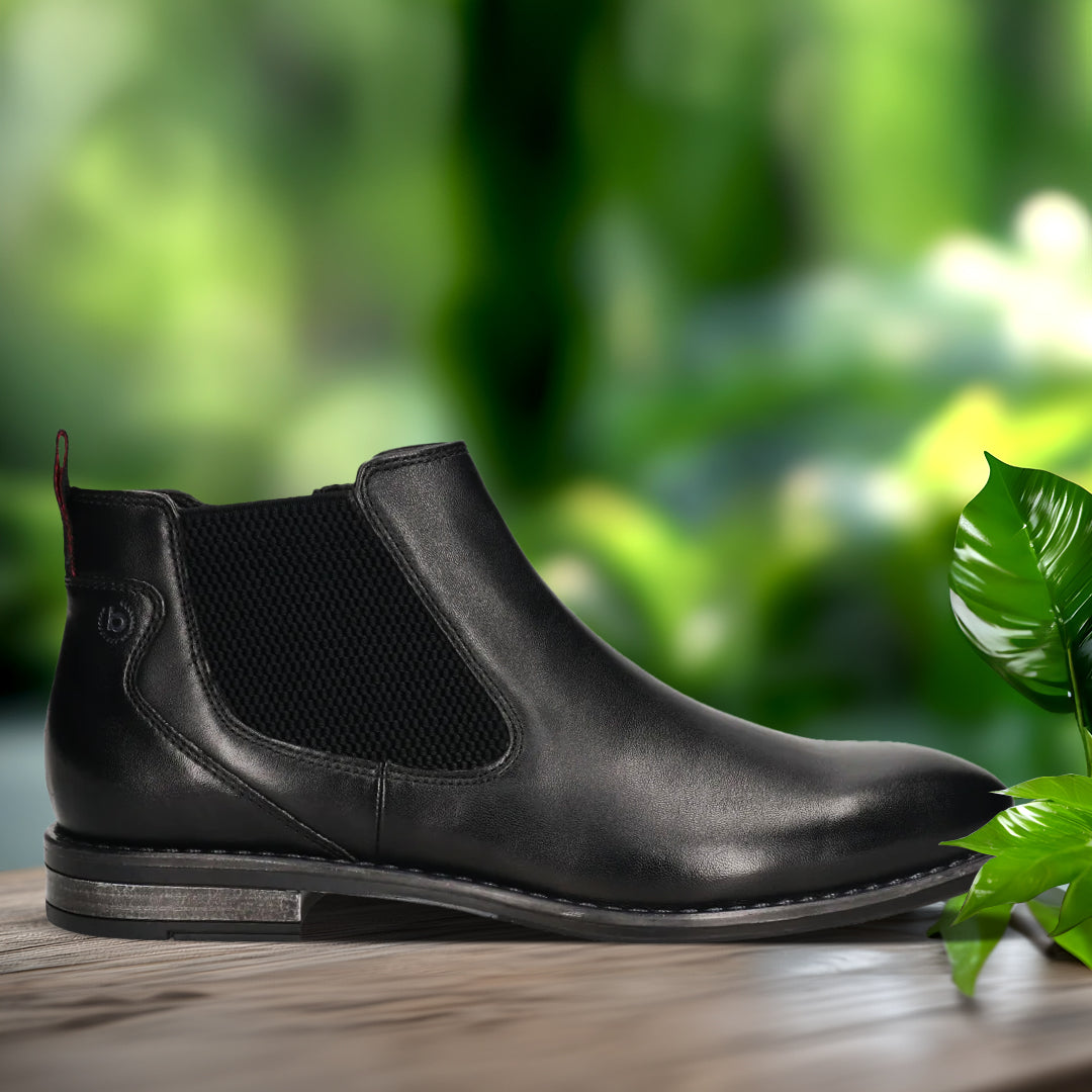 A black Men's bugatti Chelsea Boots featuring a round toe plain toe, moulded  heel, and a wide fit. Made from premium genuine leather with a durable tr outsole, this zipper design offers both style and comfort.
