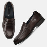 Men's Bugatti penny loafer brown leather shoes with a pointed toe and apron toe featuring a moulded heel , a tpr outsole.