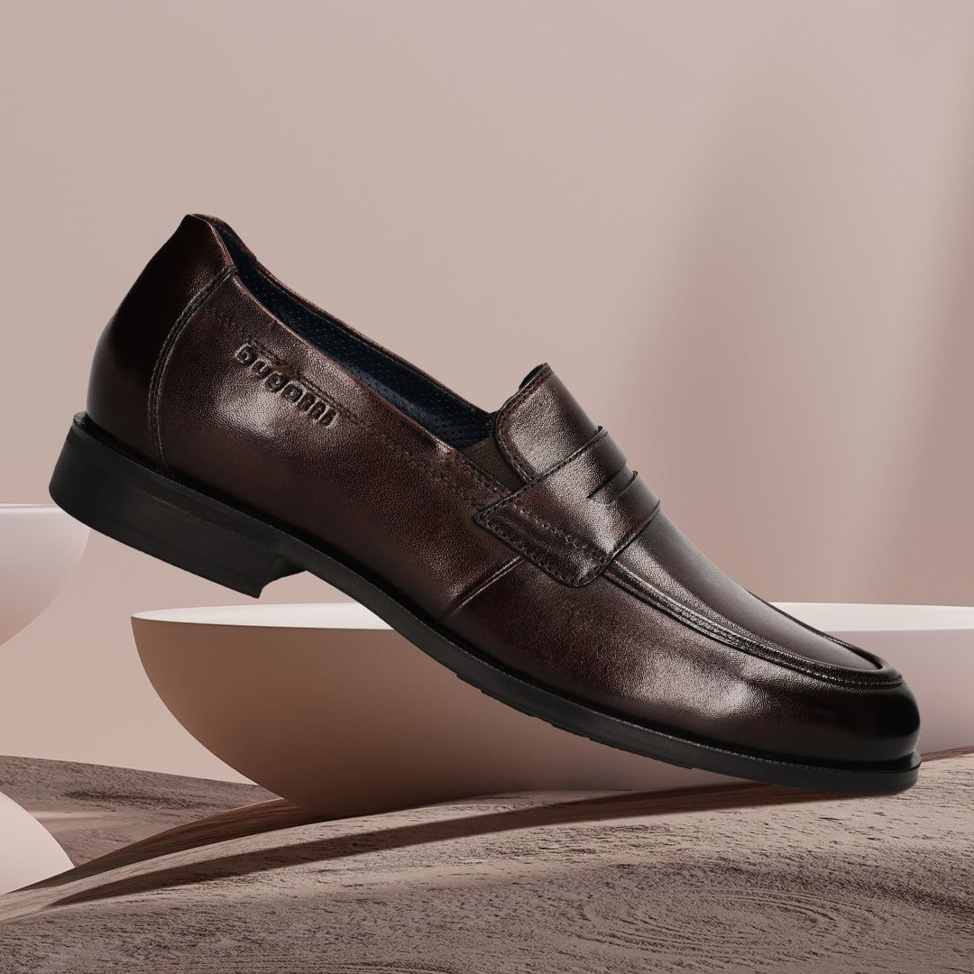 Men's Bugatti penny loafer brown leather shoes with a pointed toe and apron toe featuring a moulded heel , a tpr outsole.