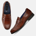 Men's Bugatti penny loafer cognac leather shoes with a pointed toe and apron toe featuring a moulded heel , a tpr outsole.