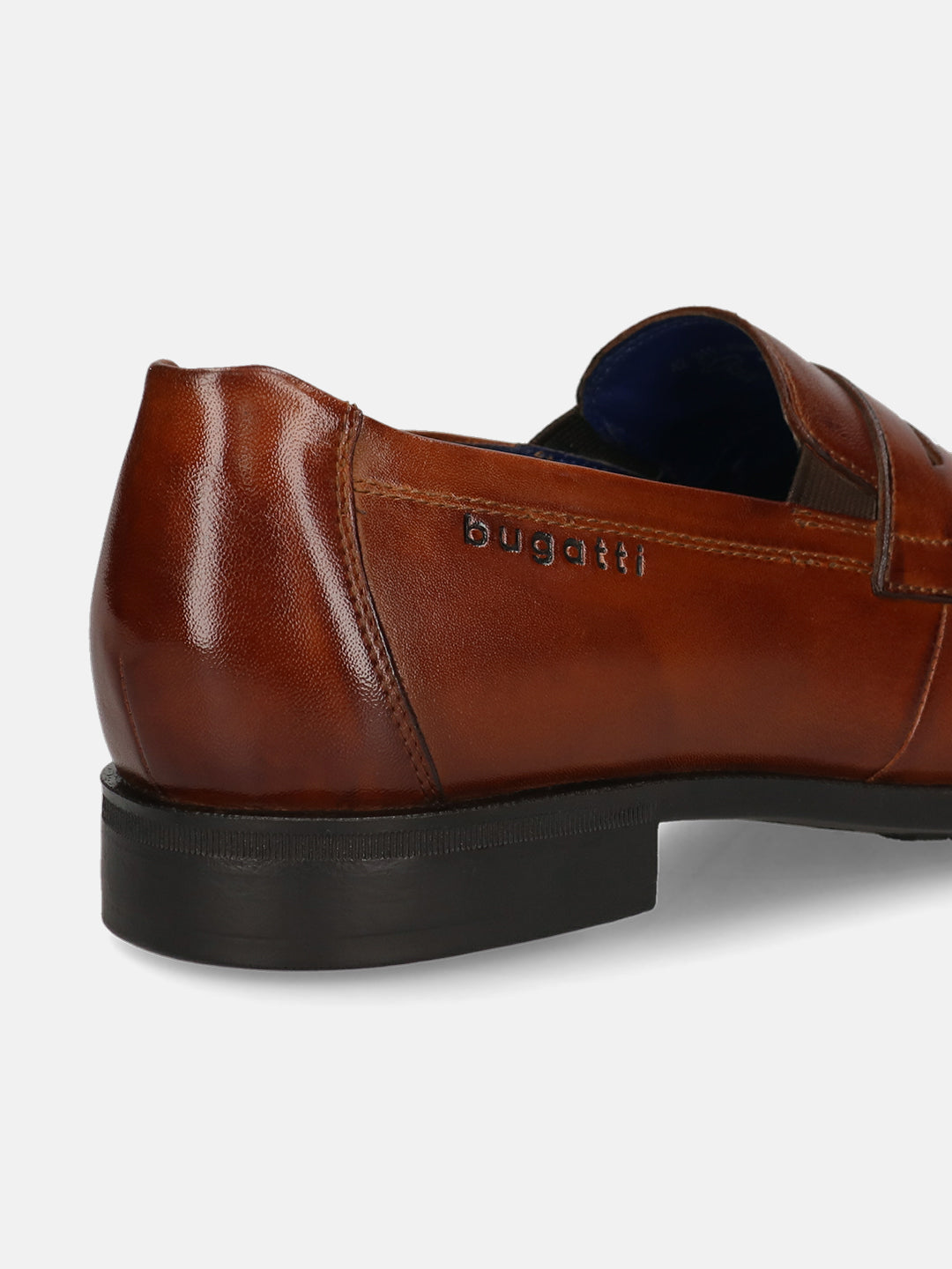 Men's Bugatti penny loafer cognac leather shoes with a pointed toe and apron toe featuring a moulded heel , a tpr outsole.