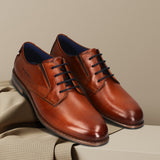 Men's Bugatti derby cognac leather shoes with a round toe and plain toe featuring a moulded heel , a tpr outsole , and laces fastening.
