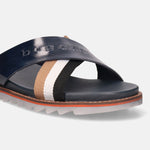 A blue Men's bugatti Cross Strap Sandals featuring a round open toe, zero heels heel, and a wide fit. Made from premium genuine leather with a durable eva outsole, this slip-on design offers both style and comfort.