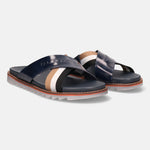 A blue Men's bugatti Cross Strap Sandals featuring a round open toe, zero heels heel, and a wide fit. Made from premium genuine leather with a durable eva outsole, this slip-on design offers both style and comfort.
