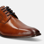 A cognac Men's bugatti Derby featuring a round toe plain toe, stacked heel. Made from premium genuine leather with a durable leather outsole, this laces design offers both style and comfort.