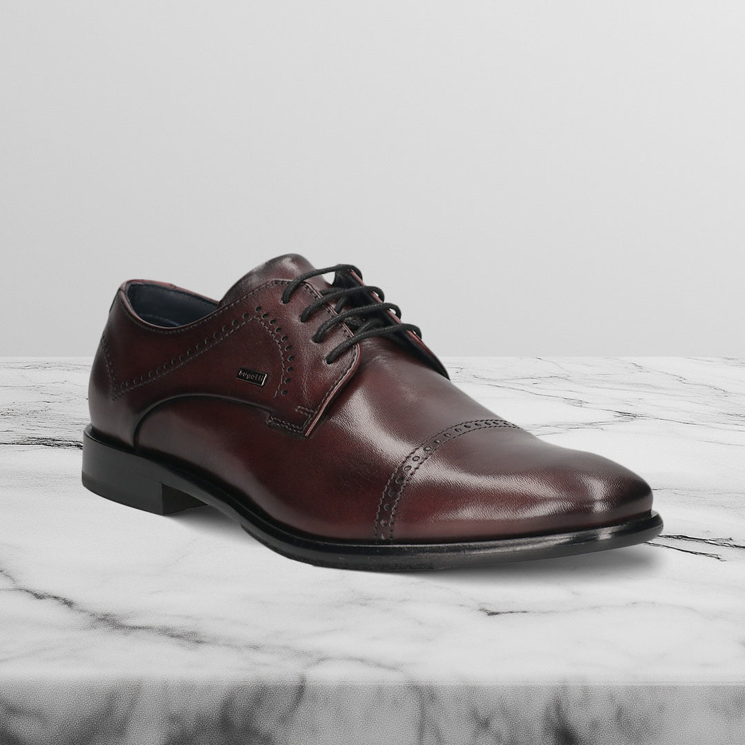A grey Men's bugatti Derby featuring a round toe cap toe, stacked heel. Made from premium genuine leather with a durable leather outsole, this laces design offers both style and comfort.