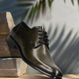 Men's Bugatti derby green leather shoes with a pointed toe and plain toe featuring a stacked heel , a leather outsole , and laces fastening.