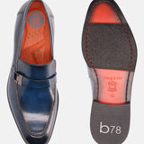 A blue Men's bugatti Penny Loafer featuring a round plain toe, stacked heel. Made from premium genuine leather with a durable leather outsole, this slip-on design offers both style and comfort.