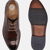 A brown Men's bugatti Derby featuring a round cap toe, stacked heel. Made from premium genuine leather with a durable leather outsole, this laces design offers both style and comfort.