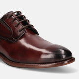 A grey Men's bugatti Derby featuring a round plain toe, stacked heel. Made from premium genuine leather with a durable leather outsole, this laces design offers both style and comfort.