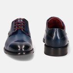 A blue Men's bugatti Derby featuring a round plain toe, stacked heel. Made from premium genuine leather with a durable leather outsole, this laces design offers both style and comfort.