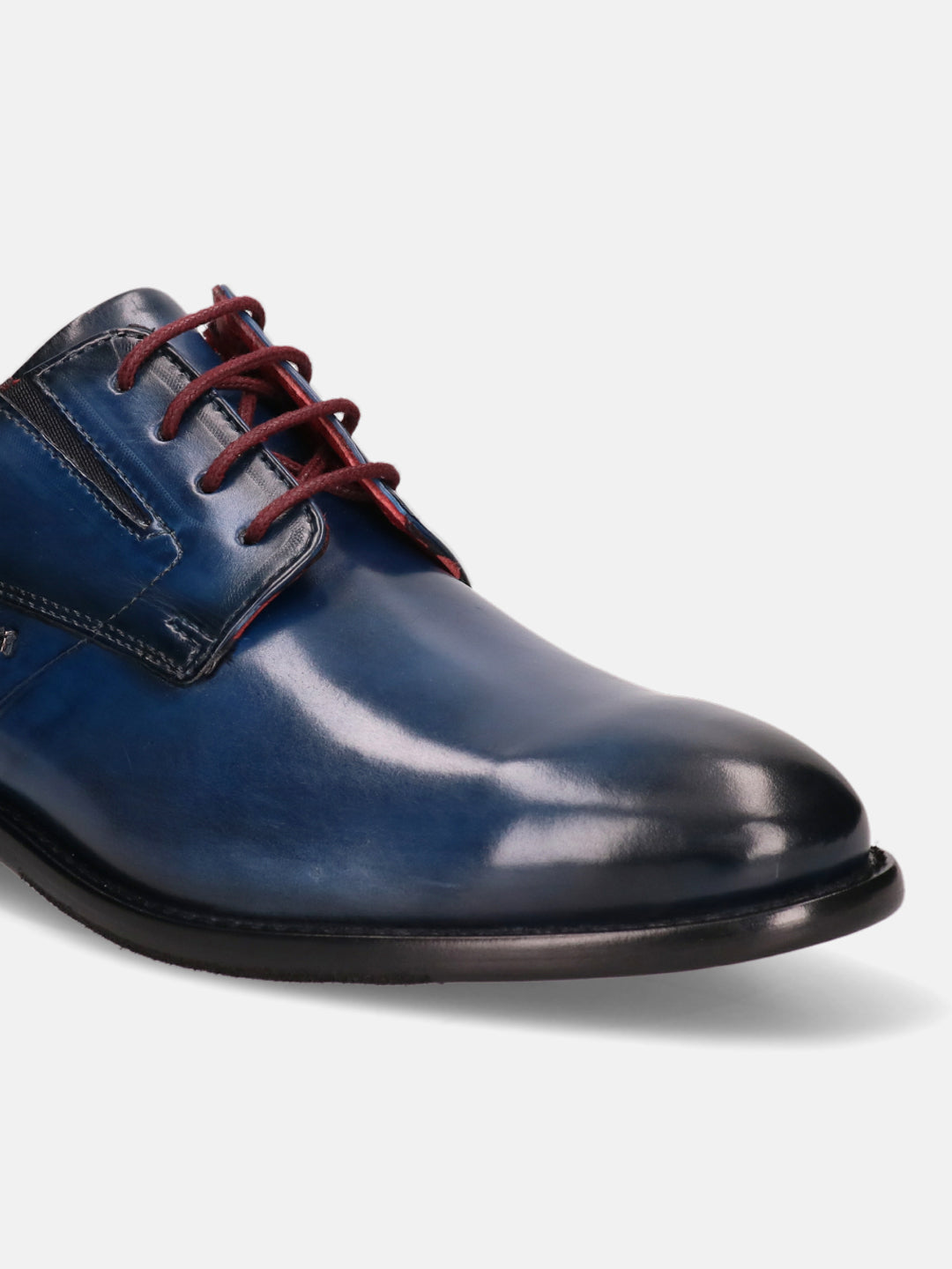 A blue Men's bugatti Derby featuring a round plain toe, stacked heel. Made from premium genuine leather with a durable leather outsole, this laces design offers both style and comfort.