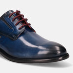 A blue Men's bugatti Derby featuring a round plain toe, stacked heel. Made from premium genuine leather with a durable leather outsole, this laces design offers both style and comfort.