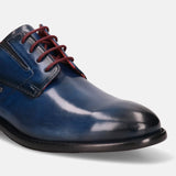 A blue Men's bugatti Derby featuring a round plain toe, stacked heel. Made from premium genuine leather with a durable leather outsole, this laces design offers both style and comfort.