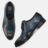 Men's Bugatti derby blue leather shoes with a round toe and wing tip featuring a stacked heel , a leather outsole , and laces fastening.