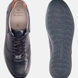 A blue Men's bugatti Sneakers featuring a round plain toe, zero heels heel. Made from premium genuine leather with a durable tr outsole, this laces design offers both style and comfort.