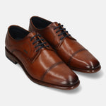 A cognac Men's bugatti Derby featuring a round toe cap toe, stacked heel. Made from premium genuine leather with a durable leather outsole, this laces design offers both style and comfort.
