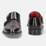 A black Men's bugatti Monk Shoe featuring a pointed plain toe, moulded heel. Made from premium genuine leather with a durable tr outsole, this slip-on design offers both style and comfort.
