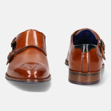 A cognac Men's bugatti Monk Shoe featuring a pointed plain toe, moulded heel. Made from premium genuine leather with a durable tr outsole, this slip-on design offers both style and comfort.