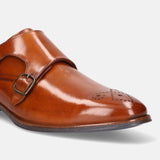 A cognac Men's bugatti Monk Shoe featuring a pointed plain toe, moulded heel. Made from premium genuine leather with a durable tr outsole, this slip-on design offers both style and comfort.
