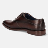 A grey Men's bugatti Oxford featuring a chisel toe plain toe, stacked heel. Made from premium genuine leather with a durable leather outsole, this laces design offers both style and comfort.