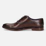 A grey Men's bugatti Oxford featuring a chisel toe plain toe, stacked heel. Made from premium genuine leather with a durable leather outsole, this laces design offers both style and comfort.