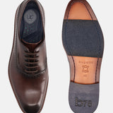 A grey Men's bugatti Oxford featuring a chisel toe plain toe, stacked heel. Made from premium genuine leather with a durable leather outsole, this laces design offers both style and comfort.
