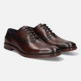 A grey Men's bugatti Oxford featuring a chisel toe plain toe, stacked heel. Made from premium genuine leather with a durable leather outsole, this laces design offers both style and comfort.