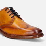 A yellow Men's bugatti Derby featuring a chisel wing tip, stacked heel. Made from premium genuine leather with a durable leather outsole, this laces design offers both style and comfort.