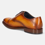 A yellow Men's bugatti Oxford featuring a round cap toe, stacked heel. Made from premium genuine leather with a durable leather outsole, this laces design offers both style and comfort.
