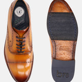 A yellow Men's bugatti Oxford featuring a round cap toe, stacked heel. Made from premium genuine leather with a durable leather outsole, this laces design offers both style and comfort.