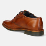 A cognac Men's bugatti Derby featuring a round toe plain toe, stacked heel, and a wide fit. Made from premium genuine leather with a durable tpr outsole, this laces design offers both style and comfort.