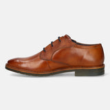 A cognac Men's bugatti Derby featuring a round toe plain toe, stacked heel, and a wide fit. Made from premium genuine leather with a durable tpr outsole, this laces design offers both style and comfort.