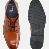 A cognac Men's bugatti Derby featuring a round toe plain toe, stacked heel, and a wide fit. Made from premium genuine leather with a durable tpr outsole, this laces design offers both style and comfort.