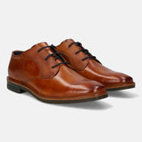 A cognac Men's bugatti Derby featuring a round toe plain toe, stacked heel, and a wide fit. Made from premium genuine leather with a durable tpr outsole, this laces design offers both style and comfort.