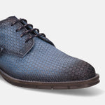 A blue Men's bugatti Derby featuring a round plain toe, moulded  heel, and a wide fit. Made from premium genuine leather with a durable tr outsole, this laces design offers both style and comfort.