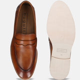 A cognac Men's bugatti Penny Loafer featuring a round apron toe, stacked heel. Made from premium genuine leather with a durable eva outsole, this slip-on design offers both style and comfort.