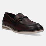A grey Men's bugatti Bit Loafer featuring a round apron toe, stacked heel. Made from premium genuine leather with a durable eva outsole, this slip-on design offers both style and comfort.