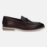 A grey Men's bugatti Bit Loafer featuring a round apron toe, stacked heel. Made from premium genuine leather with a durable eva outsole, this slip-on design offers both style and comfort.