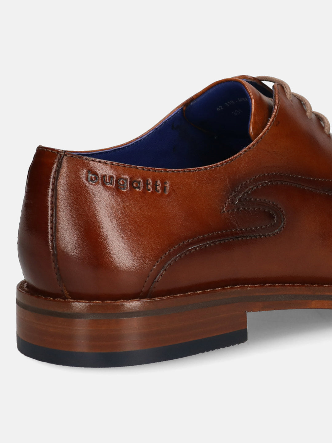 A cognac Men's bugatti Oxford featuring a almond toe medallion toe, stacked heel. Made from premium genuine leather with a durable leather outsole, this laces design offers both style and comfort.