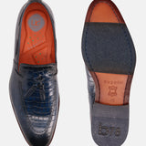 A blue Men's bugatti Tassel Loafers featuring a round toe plain toe, stacked heel. Made from premium genuine leather with a durable leather outsole, this slip-on design offers both style and comfort.